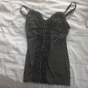 Black spaghetti strap top with white polka dots